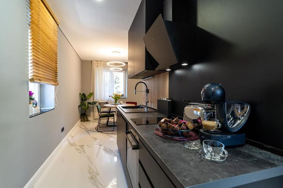 Apartment (2 Bedrooms) | Private kitchen | Oven, electric kettle, toaster, freezer
