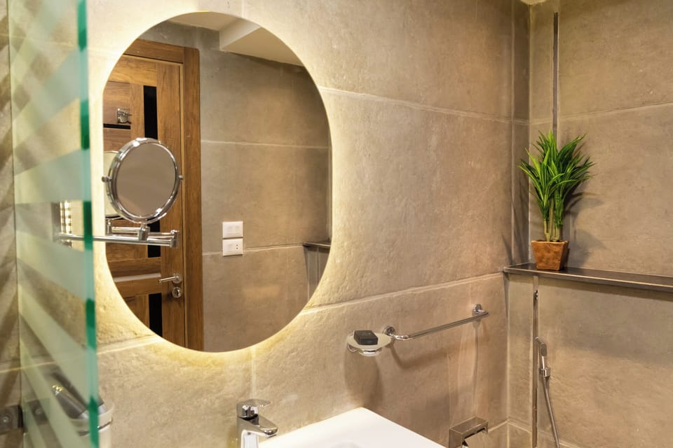 Shower, bathrobes, slippers, towels