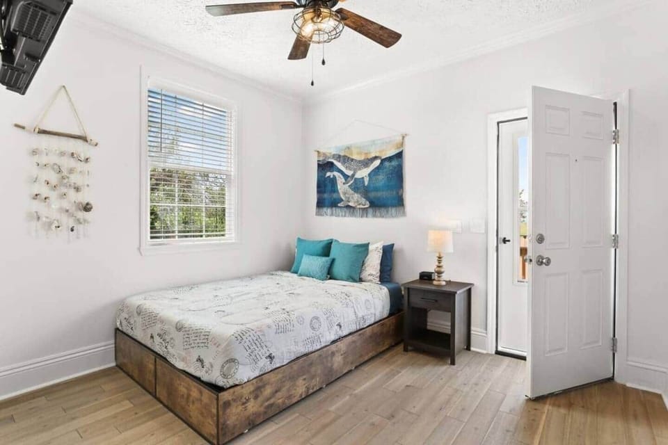 "Whitewater" master has en suite bath & direct access to the back porch, yard & cowboy pool!
