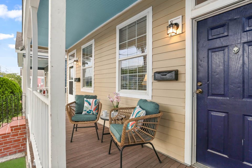 Front porch living at it's finest! Enjoy your retreat from the action in a quiet, safe neighborhood