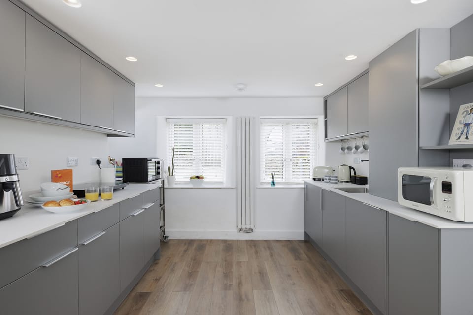 Natural light fills the well-equipped kitchen