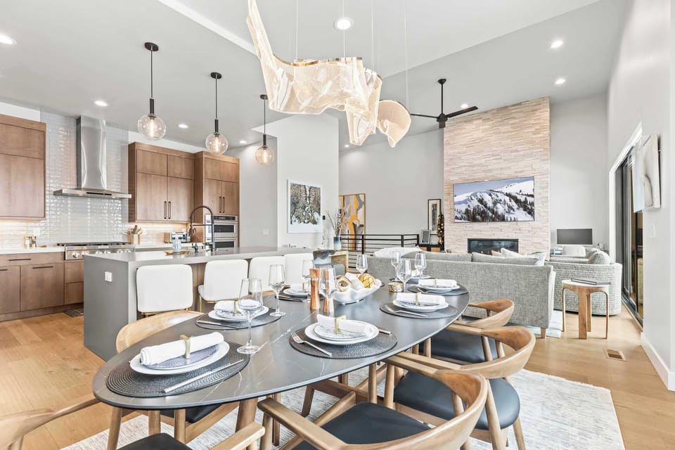 Seating for all plus a few extras at the bar! Plenty of seating at this contemporary table 