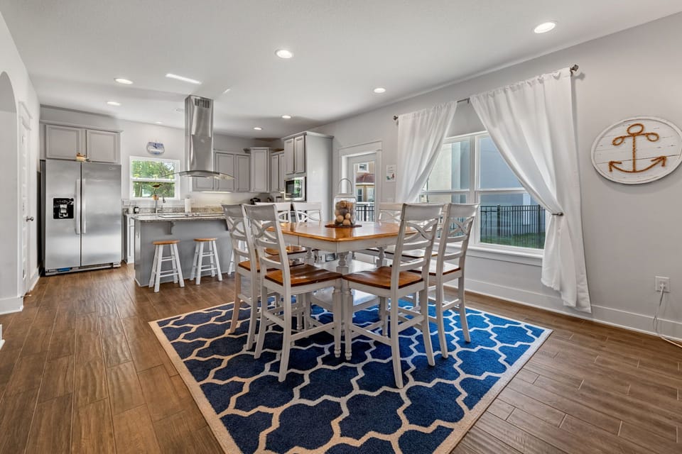 Kitchen table seats 8-9 people; perfect for family game night!