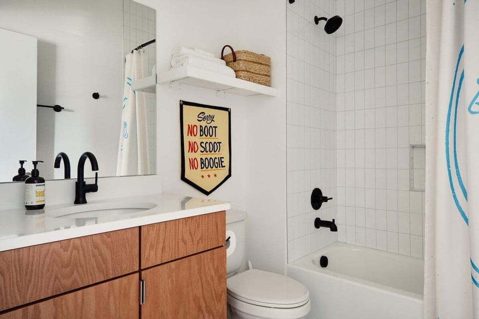 Full bathroom with shower and tub combo