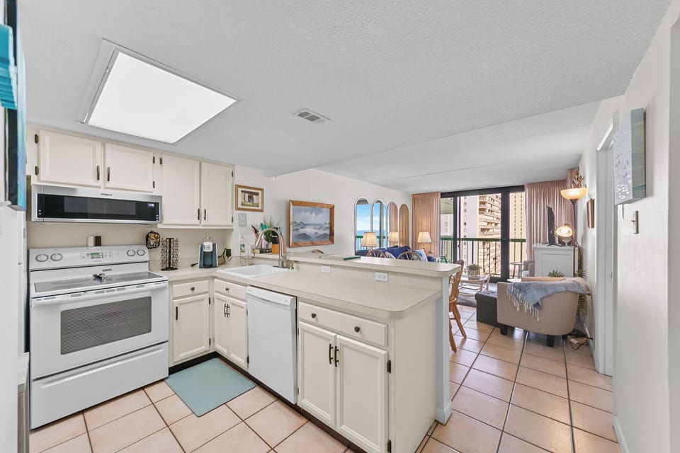 The Chef in your Family will never miss out on the Fun while Preparing Meals in this Open Kitchen!