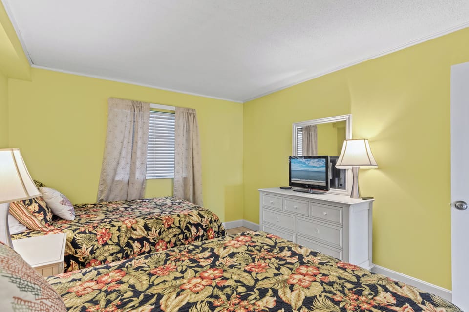 And a Flat Screen TV, the perfect place to relax and rejuvenate for the next day of fun in the sun!