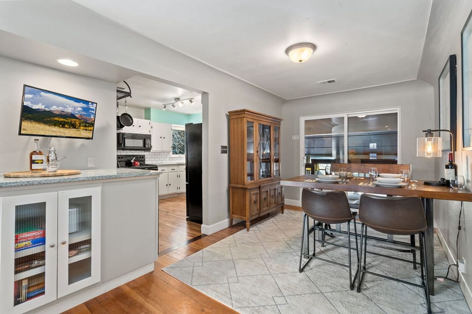 Main Level Kitchen and Dining Area | Easy access to the pool table!