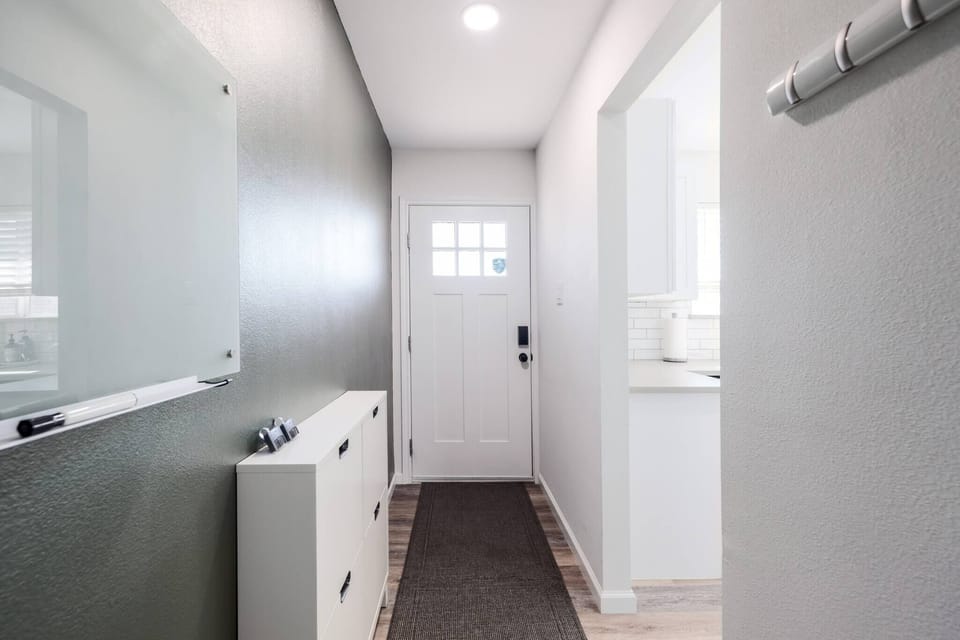 Welcoming entrance to the home, providing a stylish first impression and easy access to the living spaces.