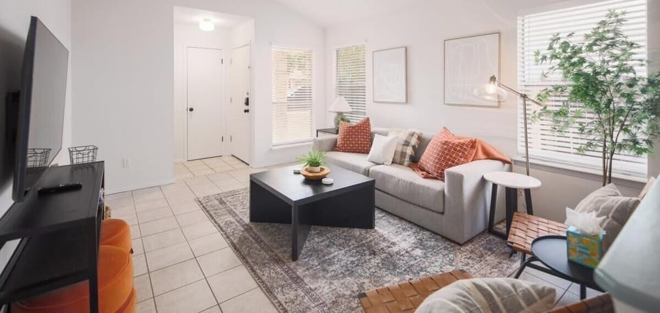 The home features secure, contactless check-in with electronically timed keys and ultra-high-speed internet. Freshly painted and filled with natural light, it feels bright and welcoming.