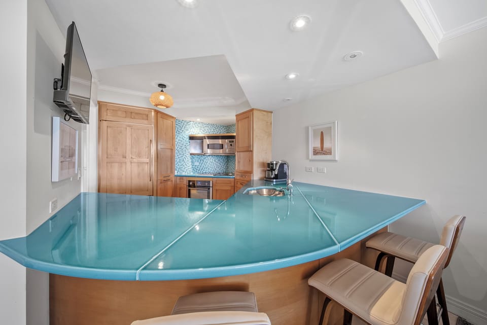 Delight in the unique swim-up bar experience, blending fun and sophistication.