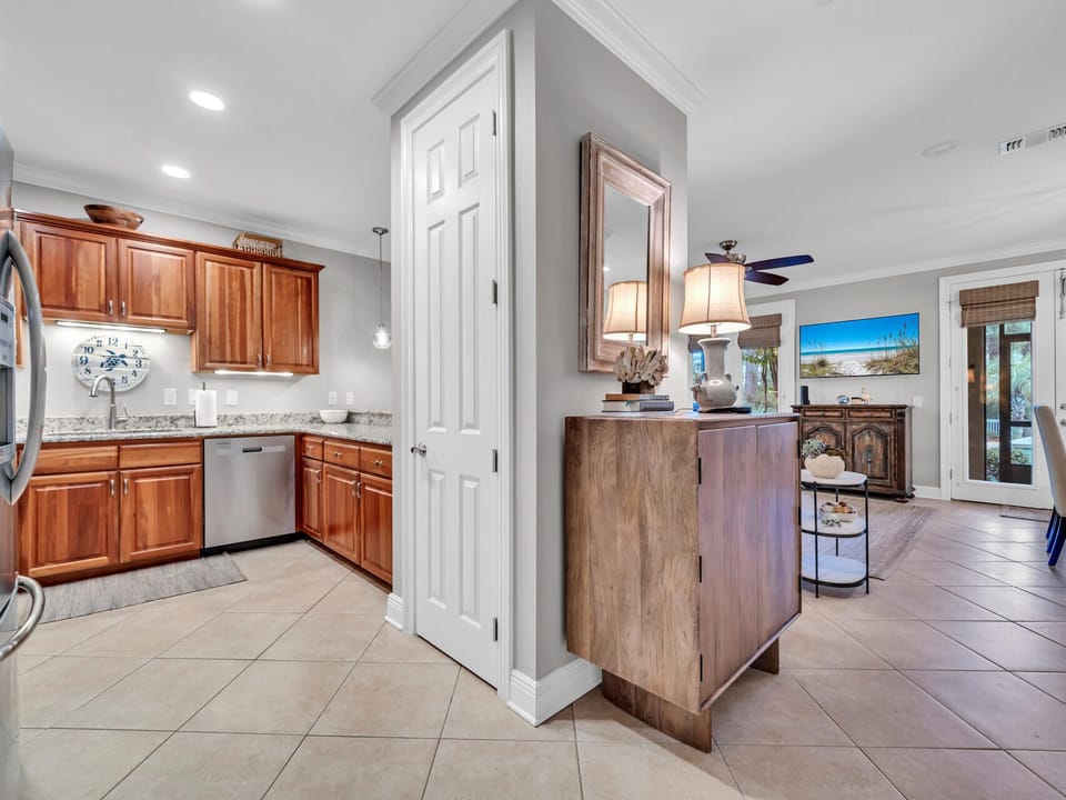 You'll love preparing meals in this fully equipped kitchen with granite counters, stainless appliances, and elegant cherry cabinets.