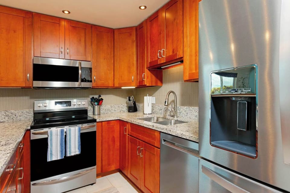 Whip up culinary delights in our fully equipped kitchen! Modern appliances & ample space for memorable meals.