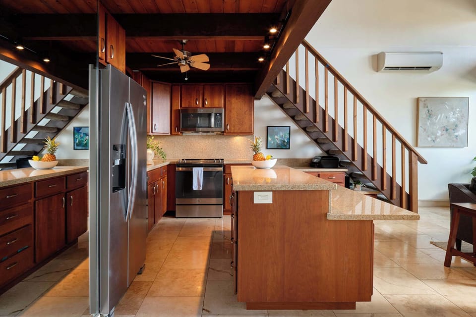 Whip up delicious meals in this fully equipped kitchen, perfect for your vacation feasts!