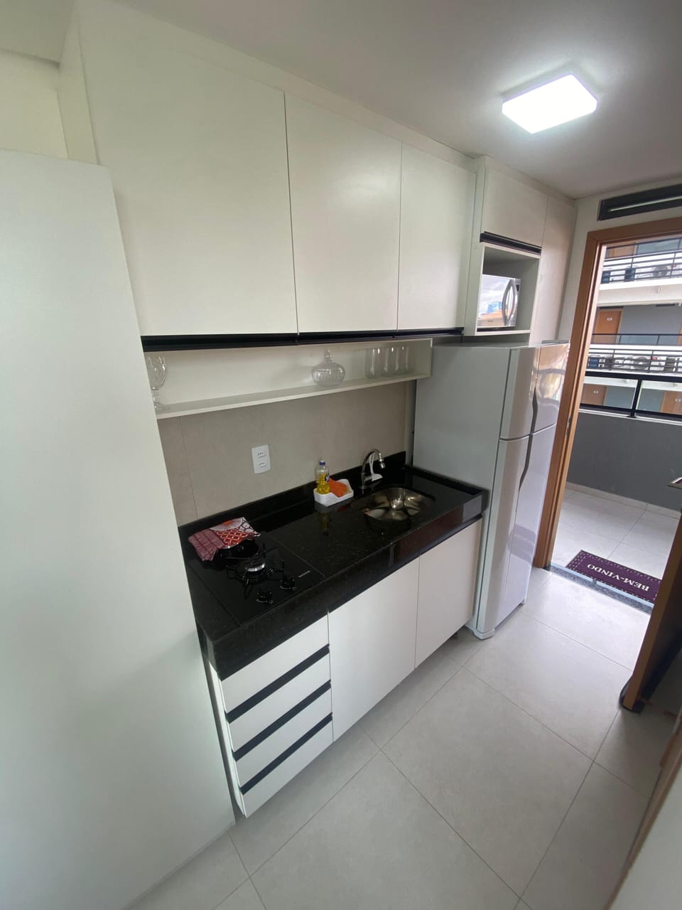 Fridge, microwave, stovetop, cookware/dishes/utensils
