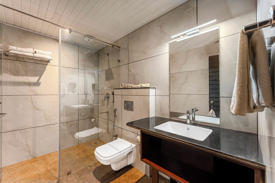 Deluxe Room, Mountain View | Desk, blackout drapes, iron/ironing board, individually furnished