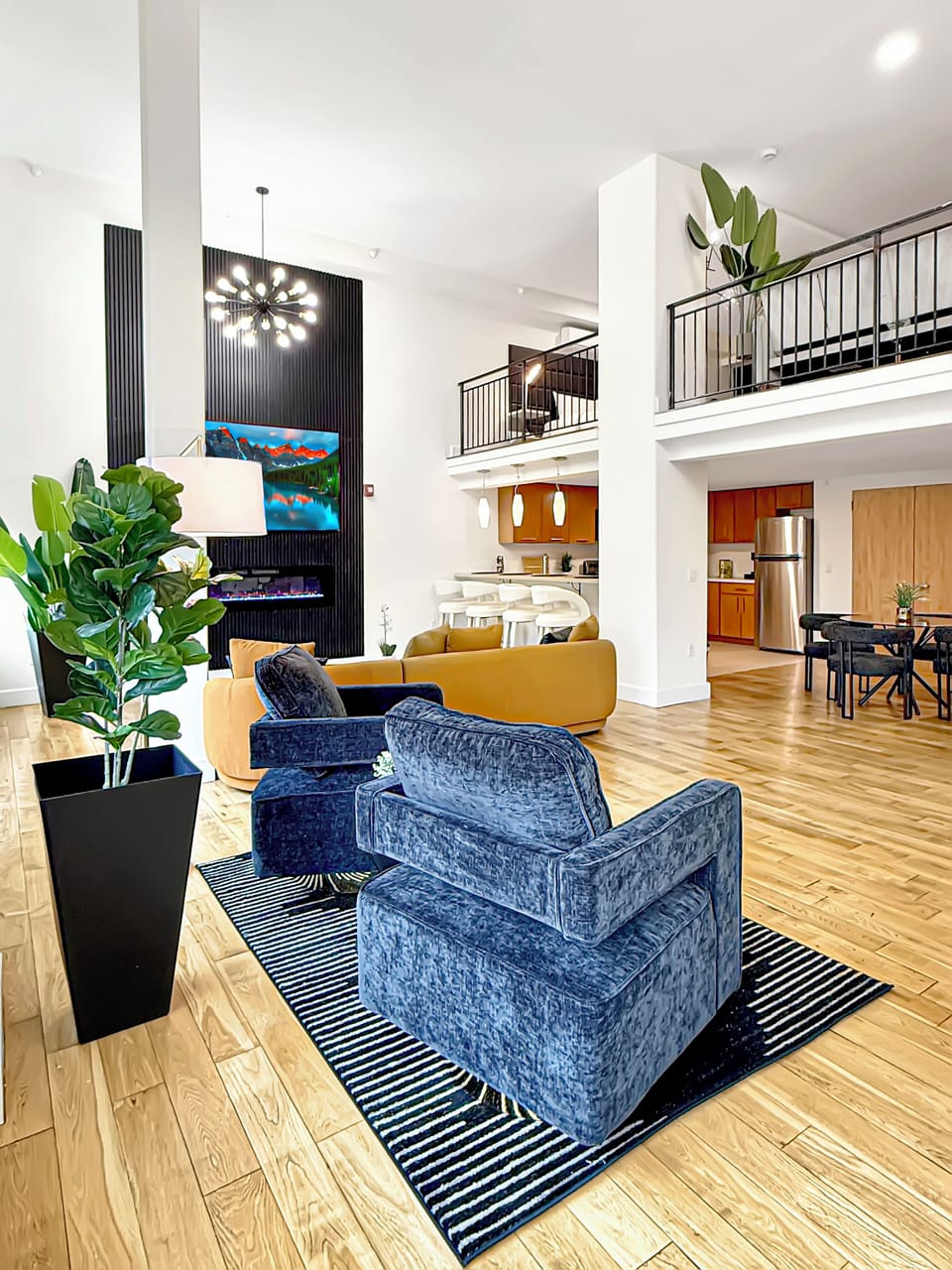 - 85” Smart TV w/ ROKU in main
- Dining Area 
- Breakfast Bar
- Full Kitchen