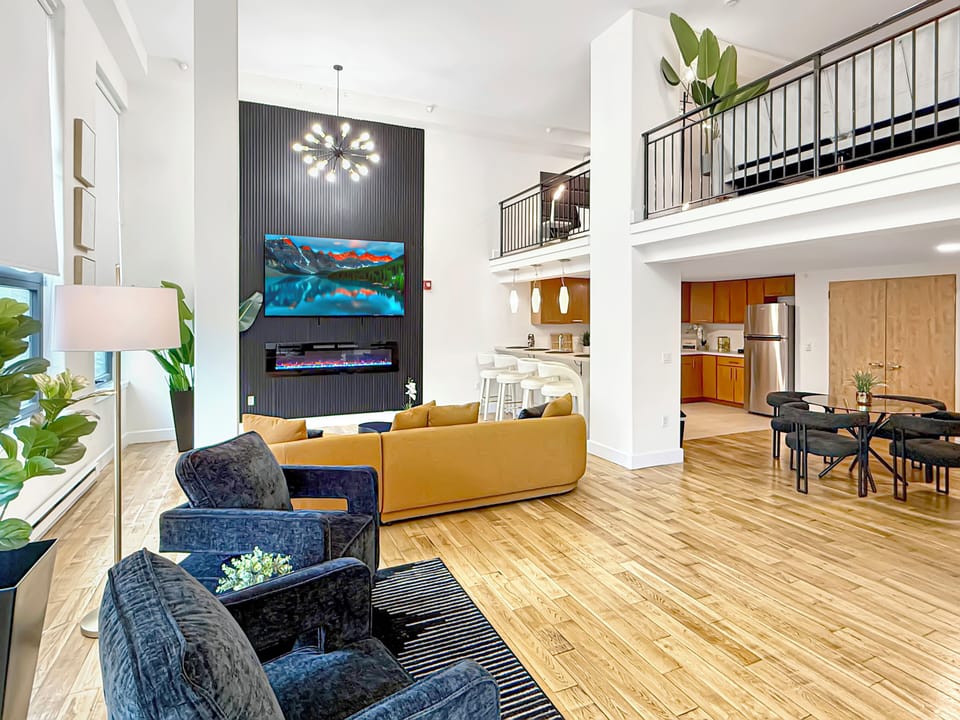 - 85” Smart TV w/ ROKU in main
- Dining Area 
- Breakfast Bar
- Full Kitchen