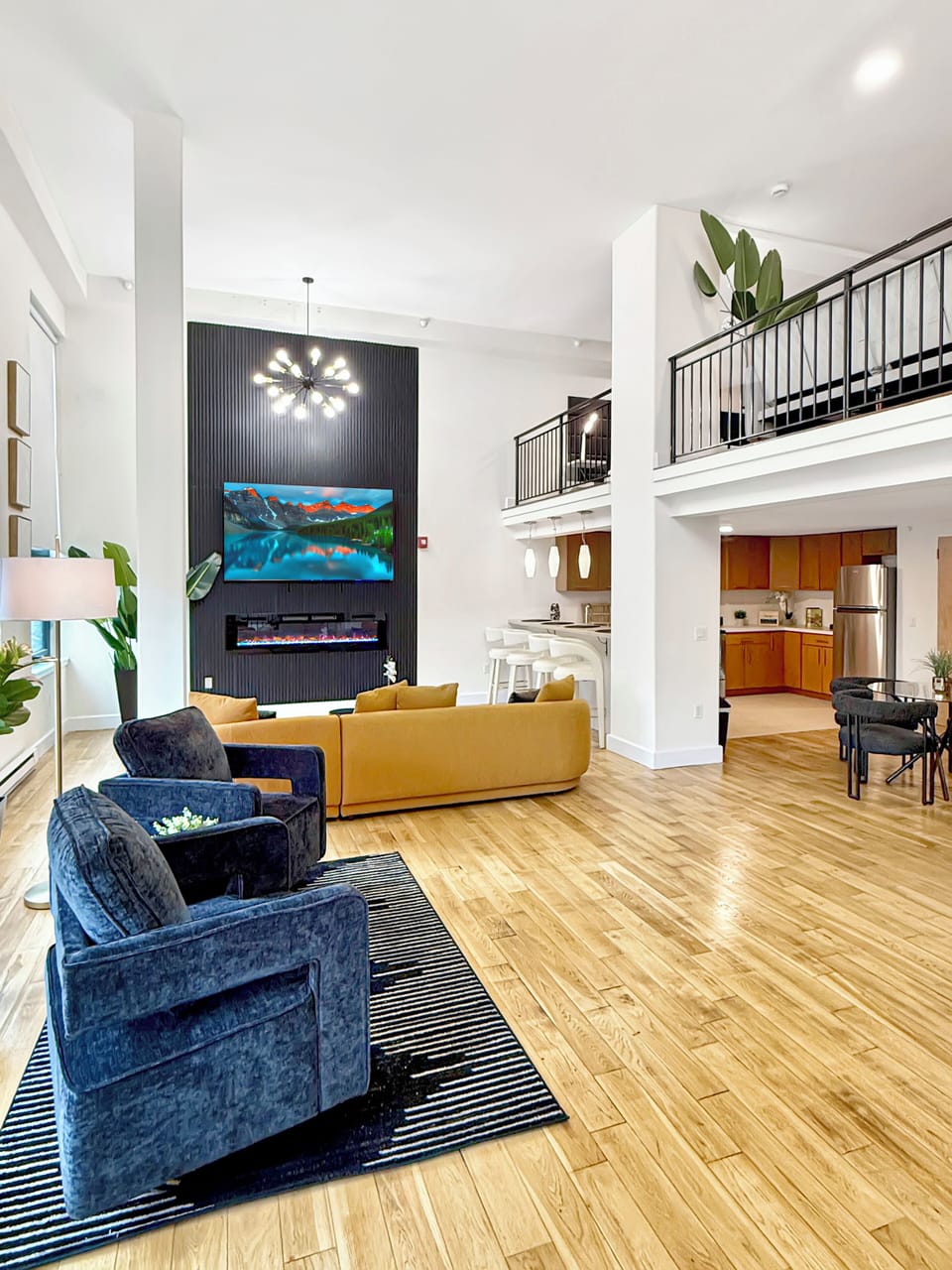 - 85” Smart TV w/ ROKU in main
- Dining Area 
- Breakfast Bar
- Full Kitchen