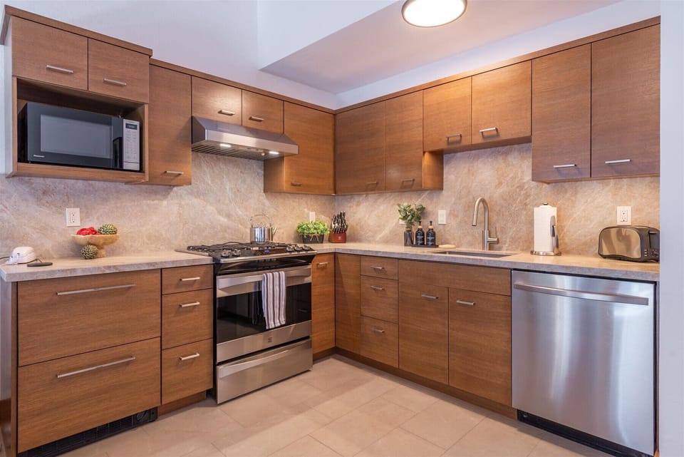 Enjoy home cooked meals in this brand new kitchen remodel. Fully equipped with granite countertops, brand new appliances, built in drawer fridge and freezer, stainless steel sink, and dishwasher.