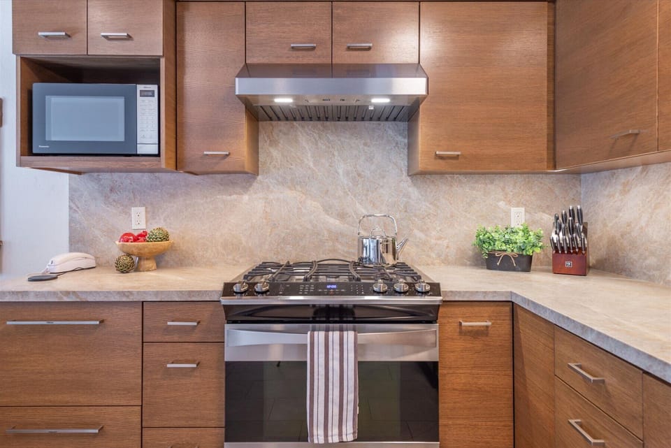 Brand new stainless steel oven and stove in this fully equipped kitchen so you can cook up any cravings during your stay.