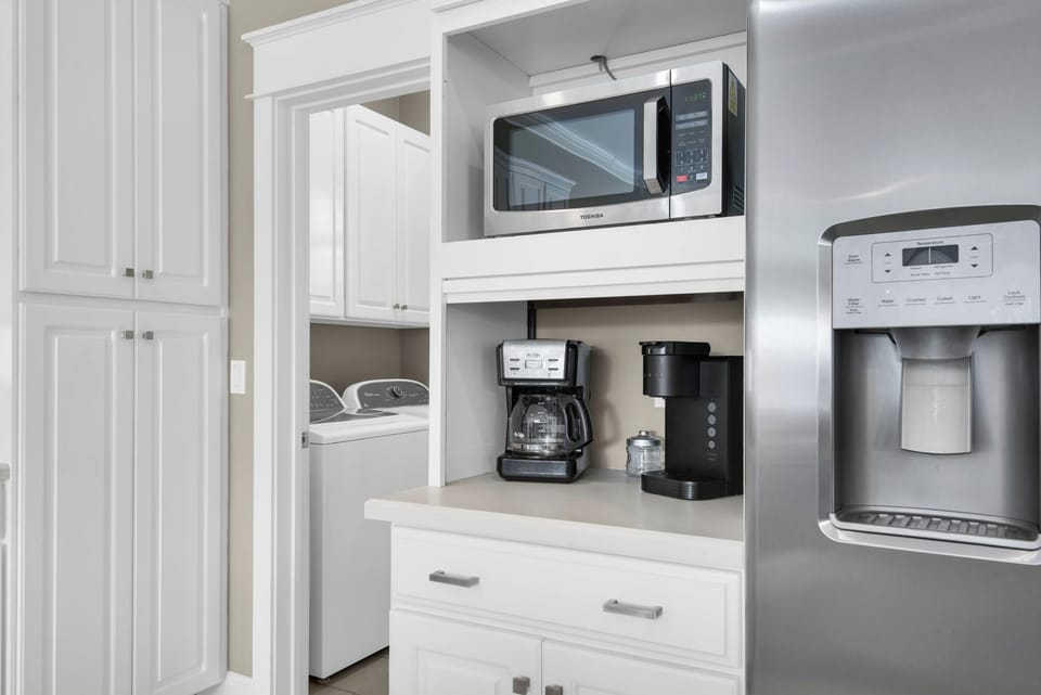 COFFEE MAKERS, MICROWAVE AND HUGE STAINLESS FRIG