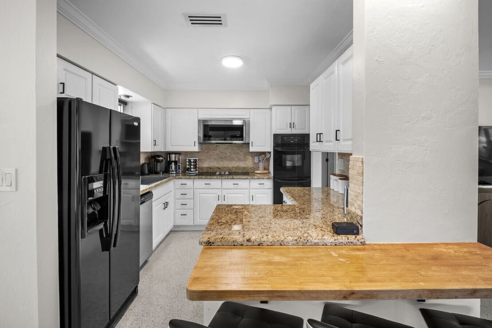 Granite counters, stainless steel appliances & everything you need
