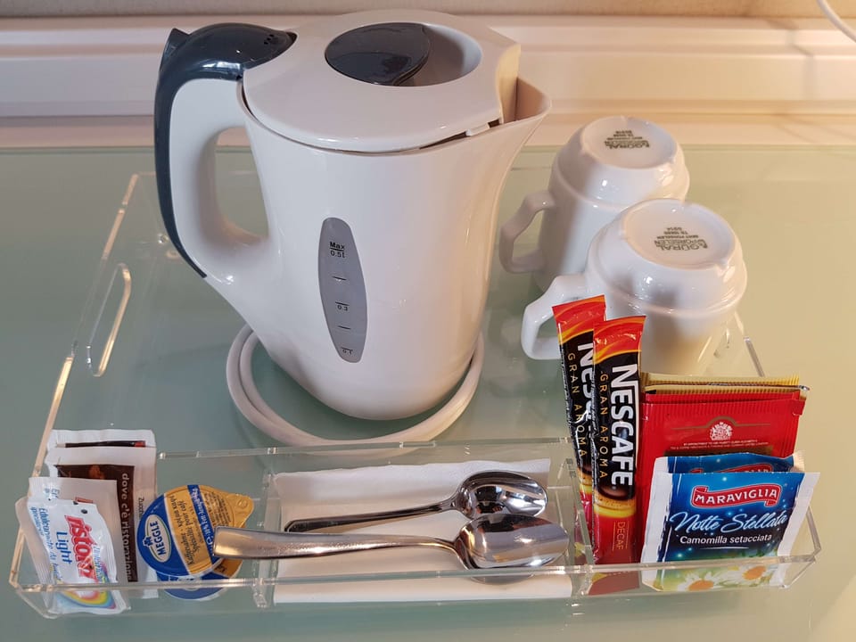 Down comforters, minibar, in-room safe, desk