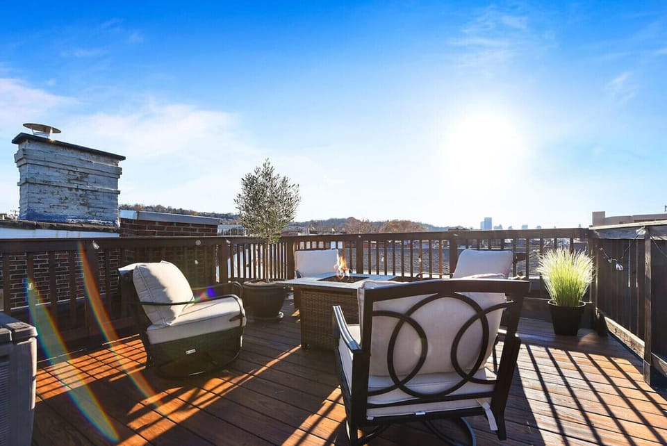Enjoy the fresh air and great views from the rooftop deck, perfect for relaxation.