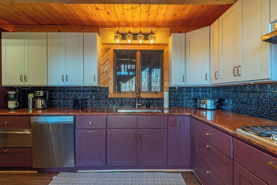 Cook in style with ample cabinetry and high-end appliances, designed for both function and luxury.