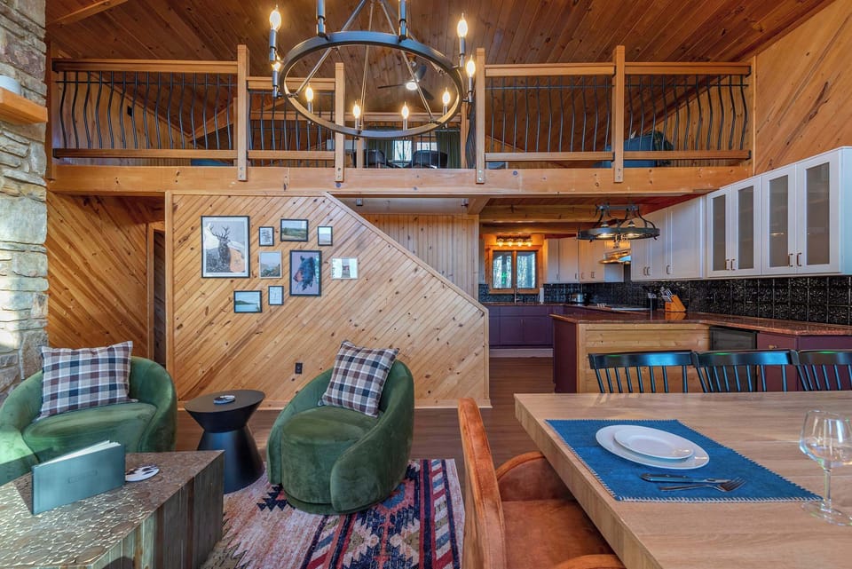 An open floor plan that invites comfort and togetherness with stunning mountain views from every angle.