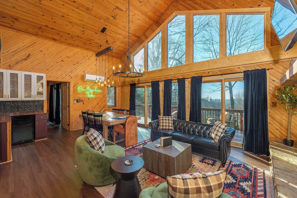 Soaring vaulted ceilings and breathtaking mountain views in an open, airy space.