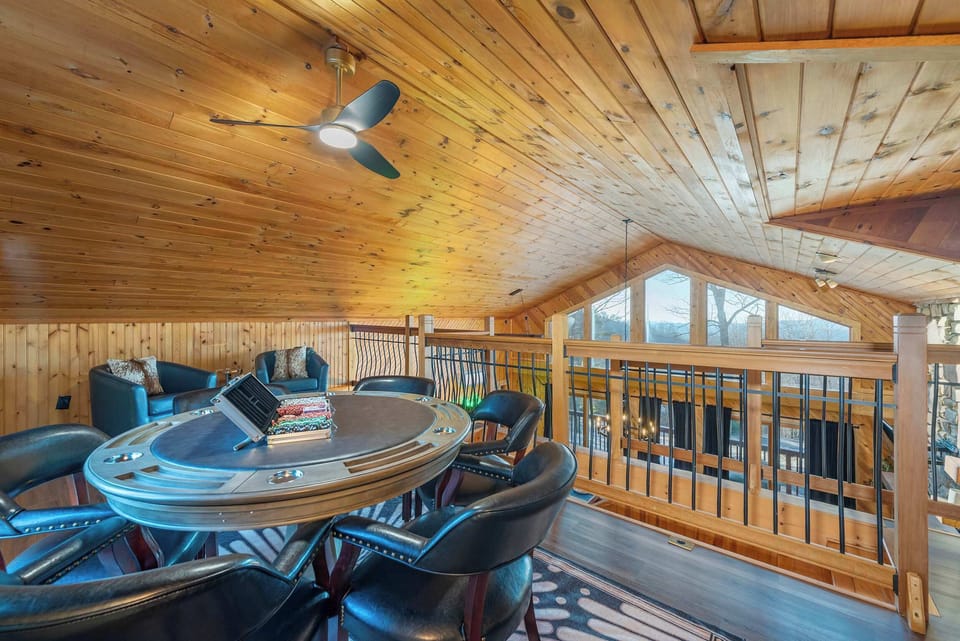 Enjoy a classic poker night in the loft area, complete with a dedicated poker table for endless entertainment.
