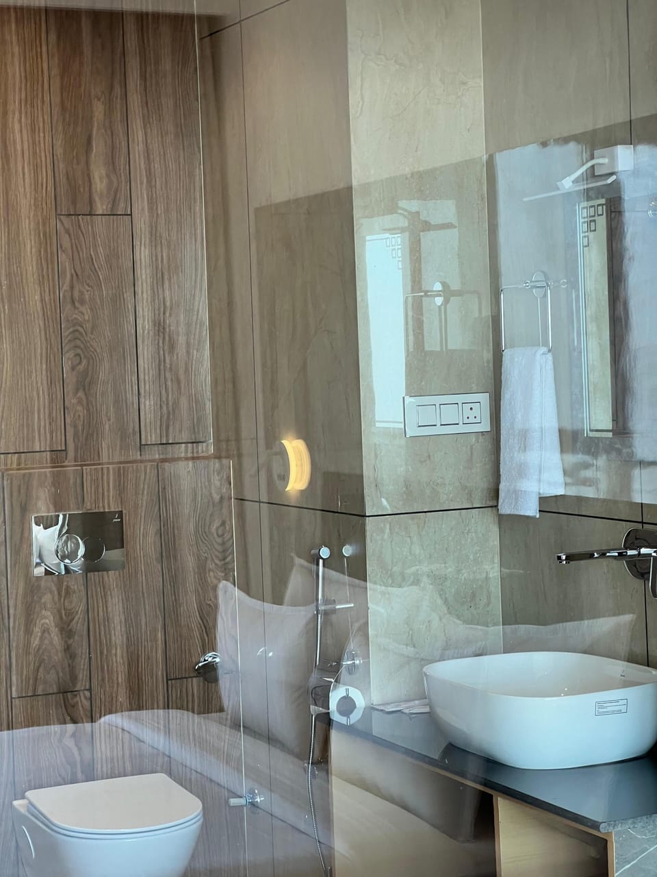 Shower, hair dryer, slippers, towels