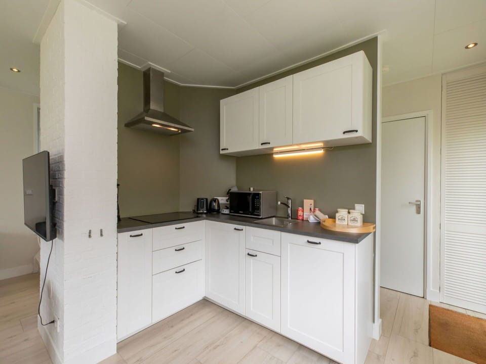 Kitchen, Interior Design, Countertop, Flooring, Wood, Cabinetry, Ceiling, Floor, Furniture, Kitchen Appliance