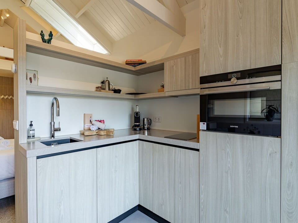Wood, Kitchen, Interior Design, Flooring, Countertop, Furniture, Ceiling, Cabinetry, Floor, Kitchen Appliance