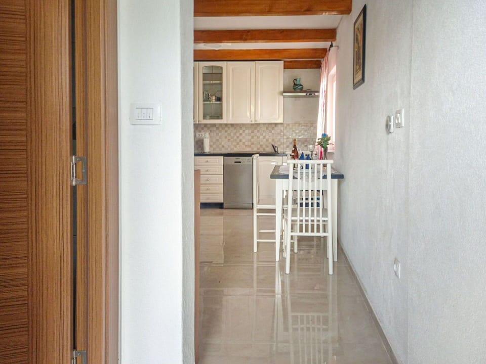 Flooring, Wood, Floor, Furniture, Interior Design, Door, Room, Wood Stain, Countertop, Apartment