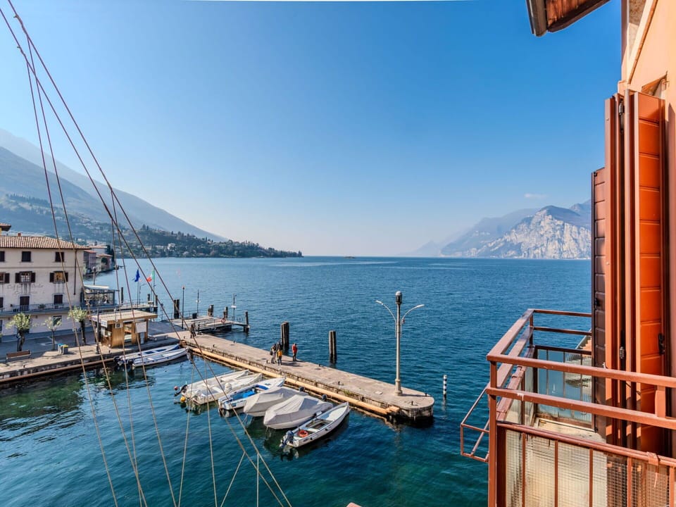 Blue, Water, Body Of Water, Mountainous Landforms, Mountain, Boat, Sea, Hill, Coastal And Oceanic Landforms, Mountain Range