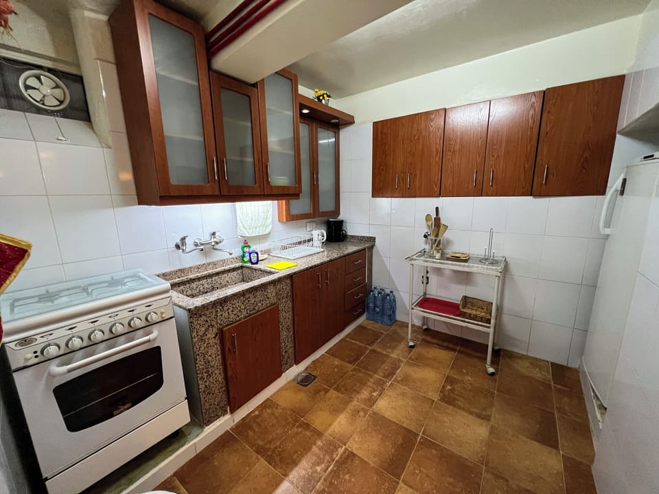 Family Apartment, Garden View | Private kitchen | Fridge, microwave, oven, stovetop