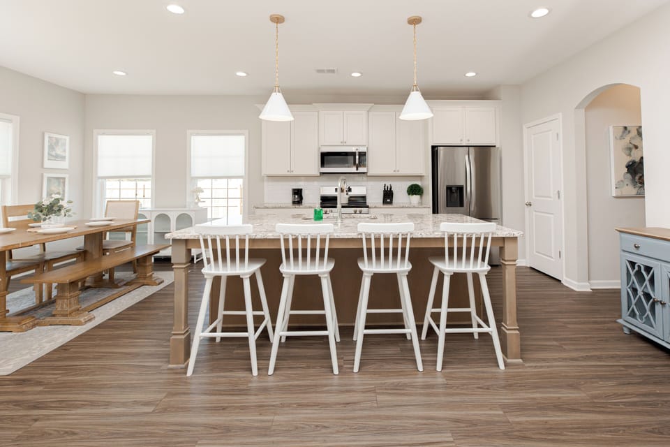 Spacious fully stocked kitchen. Bar seats 4. 
