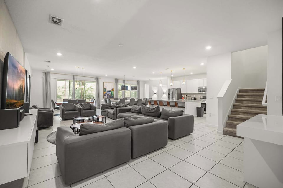 Experience luxury in this expansive living area with modern amenities, perfect for large gatherings and relaxation.