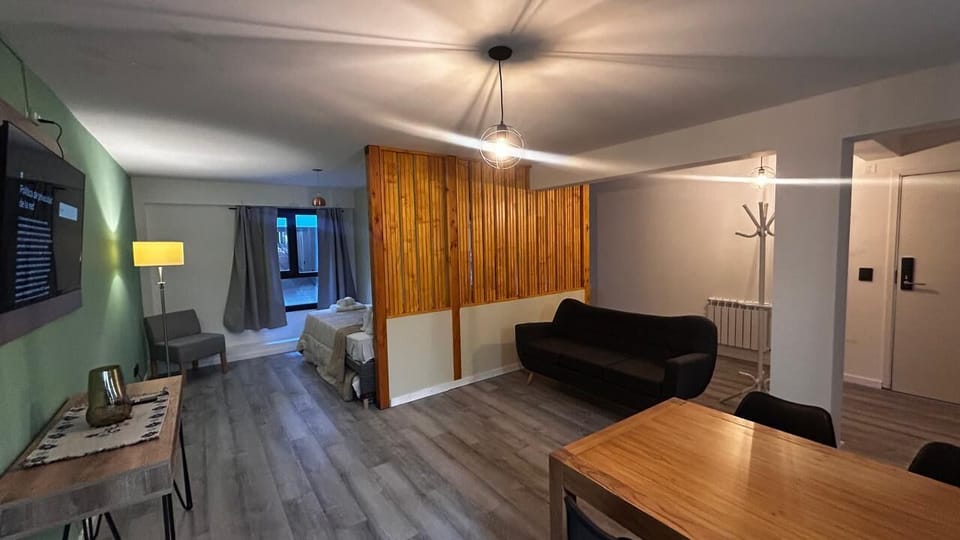 Classic Apartment, Patio, Courtyard View | Living area | Flat-screen TV