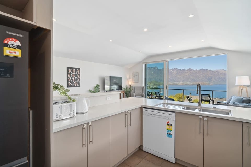 Look at that sensational view from the kitchen!  Imagine cooking up a fabulous meal for your family while gazing at the Remarkable Mountains and Lake Wakatipu!
