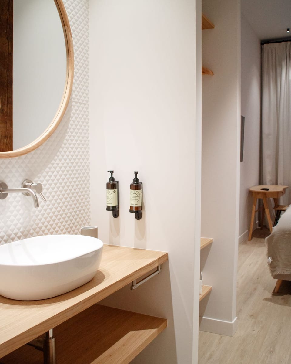 Deluxe Double Room | Bathroom | Shower, hair dryer, towels, soap
