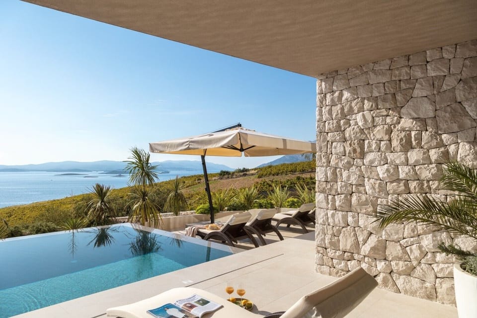 Patio with infinity heated pool, private garden, sun loungers and sea view in Luxury Rental Villa Energy Orebic - Peljesac 