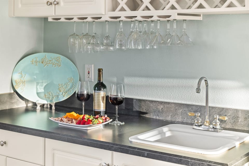 Celebrate in style at this sleek wet-bar setup