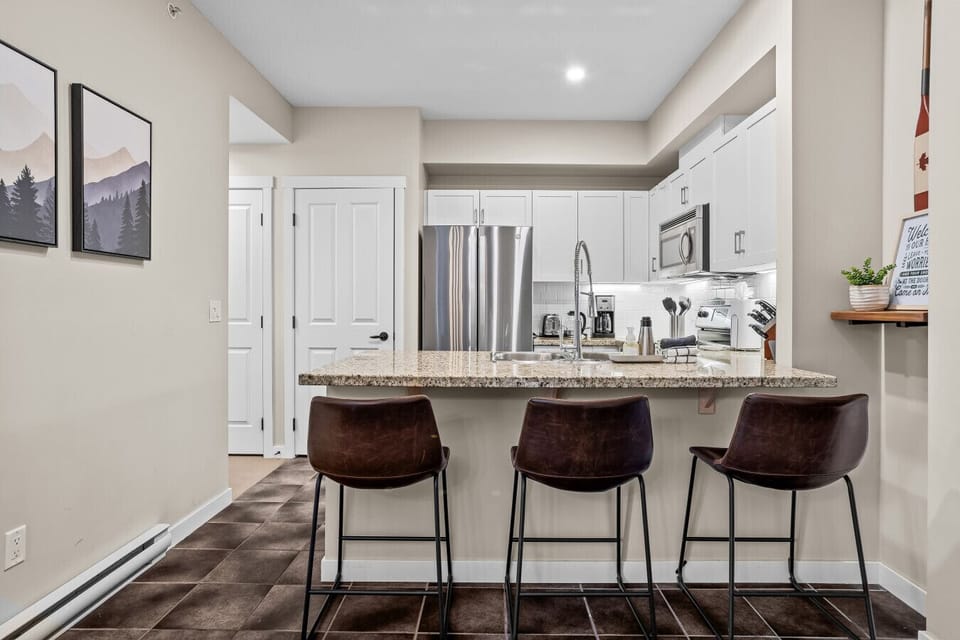 Additional kitchen dining and socializing space.