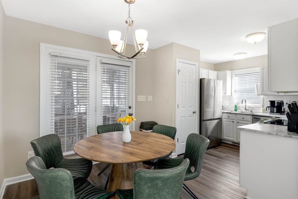 Enjoy a meal at home with a choice of dining inside or on the screened in porch.