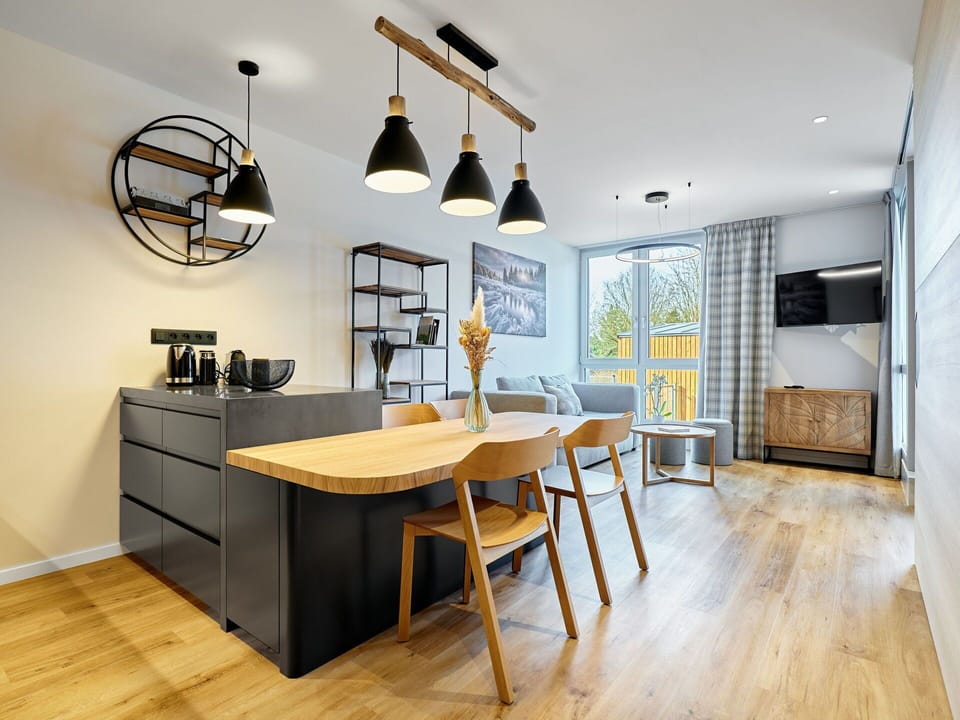 Furniture, Interior Design, Flooring, Wood, Chair, Ceiling, Floor, Light Fixture, Table, Wood Flooring