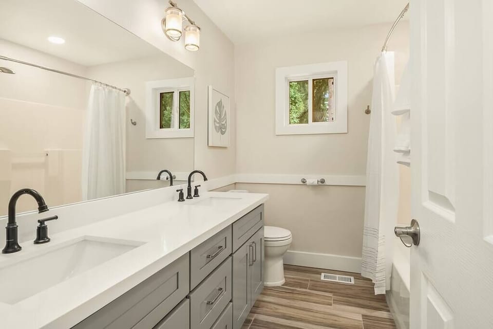 full bath with double sinks