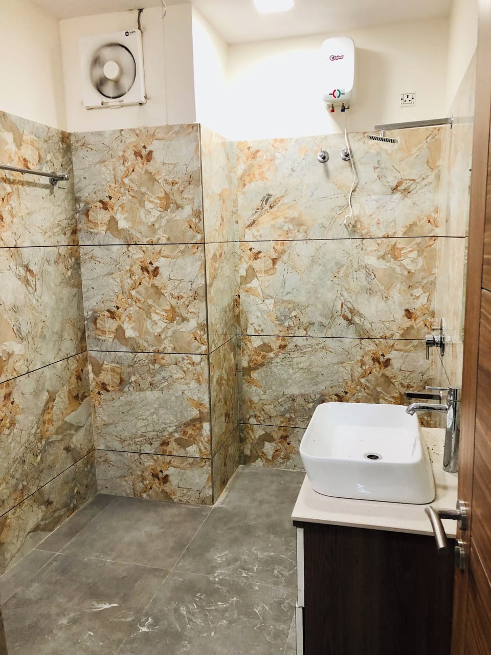 Shower, free toiletries, slippers, towels